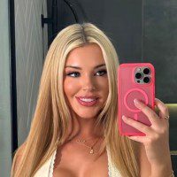 Person taking a selfie in mirror.