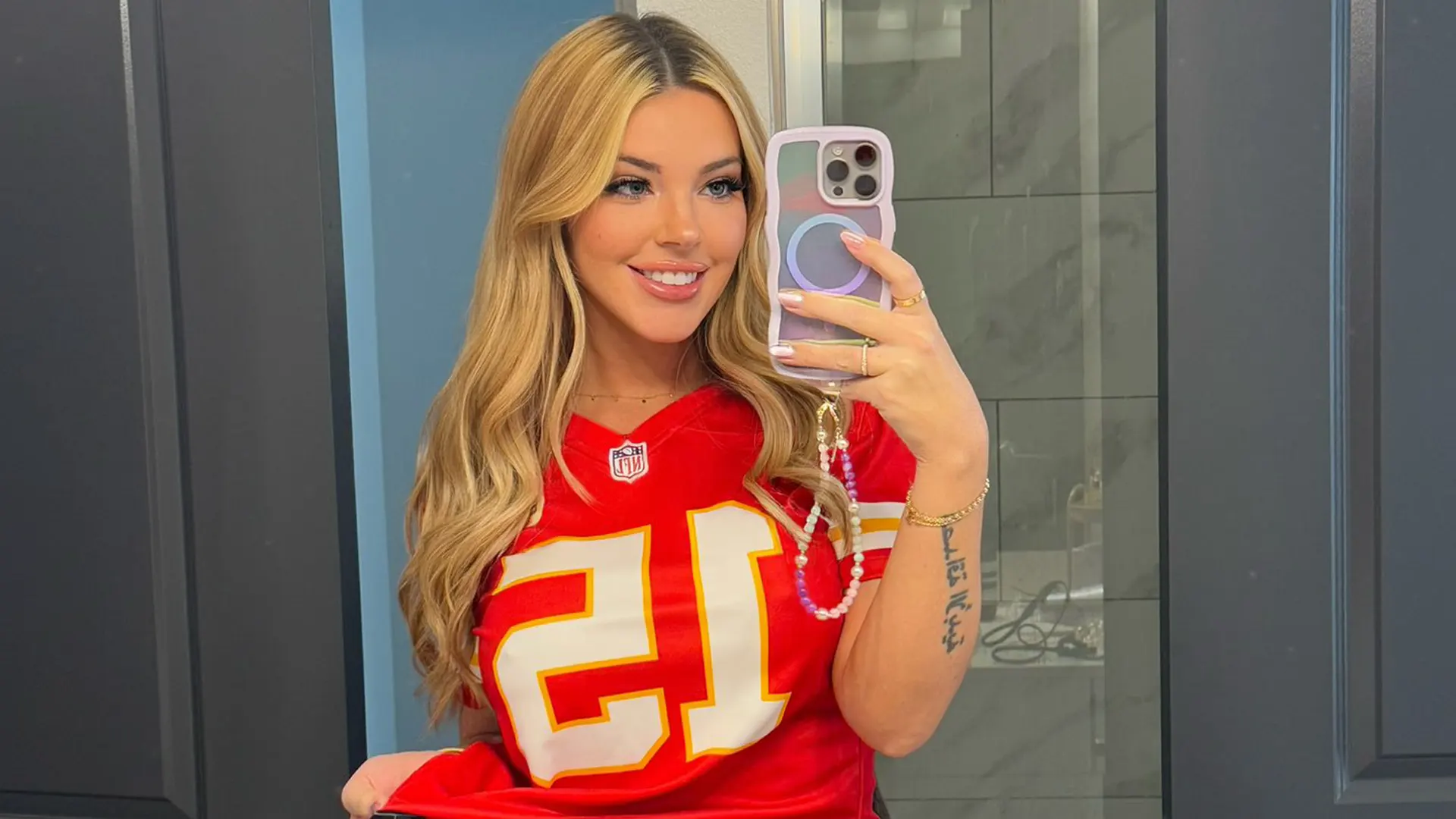 Person wearing a red sports jersey.