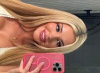 Person taking a selfie in mirror.